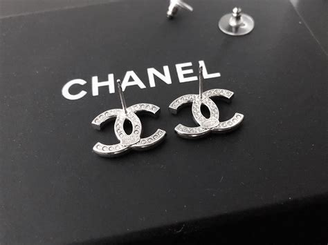 stud chanel logo earrings|authentic Chanel logo stud earrings.